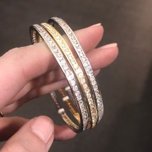 Three sterling silver and cubic zirconia bangles